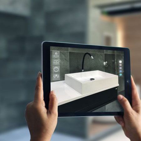 A tablet that uses Augmented Reality to show a digital double of a faucet